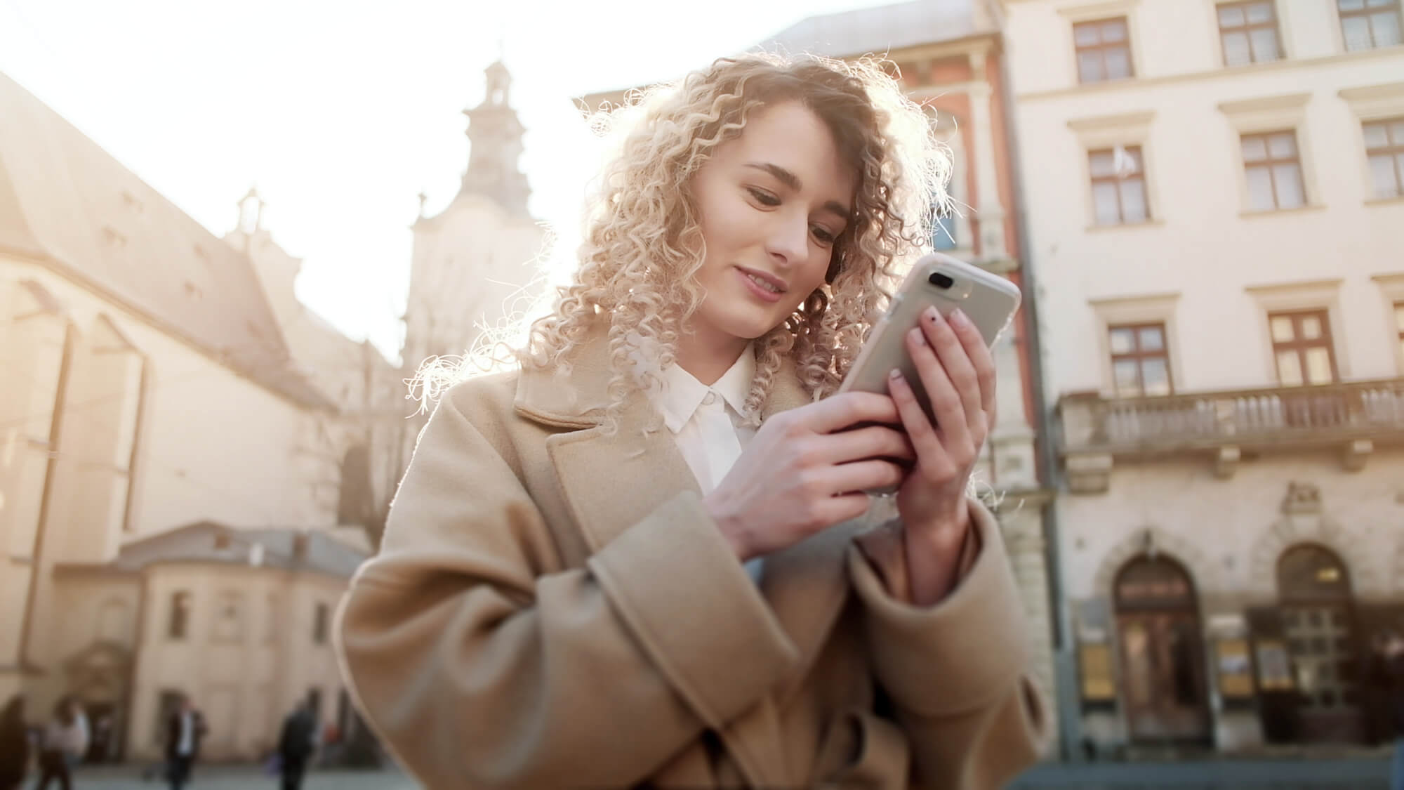 Corporate professional checking her emails on the go